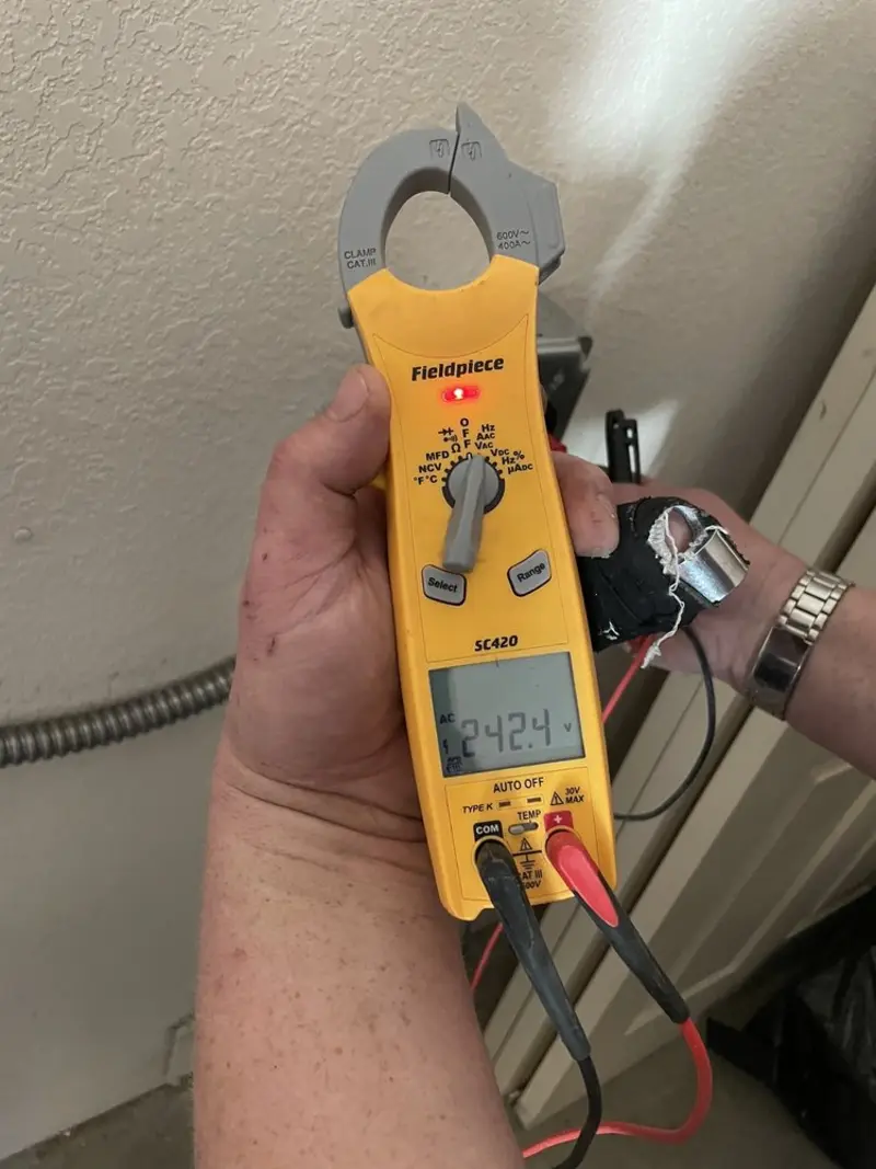 Voltage testing with clamp meter during Generator Installation in Newburyport